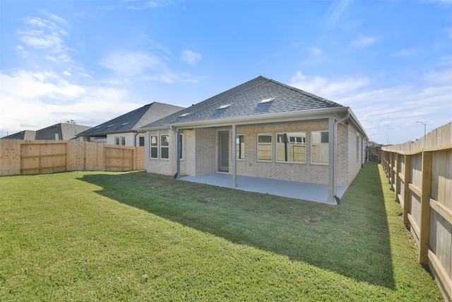 13318 Pine Lake Bnd, Tomball, TX 77375 - back of property with a yard and a patio area