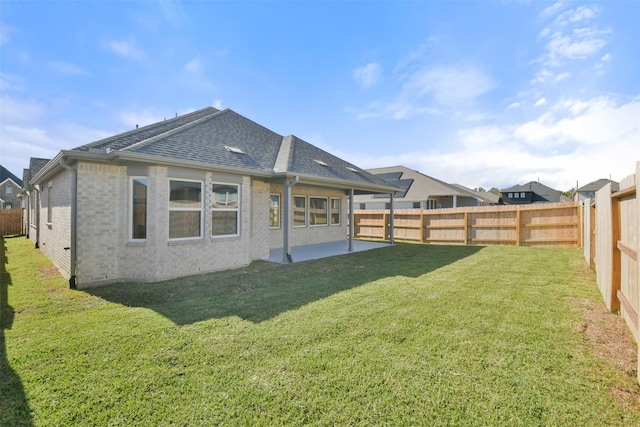 13318 Pine Lake Bnd, Tomball, TX 77375 - rear view of property with a yard and a patio