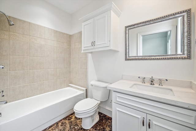 full bathroom featuring vanity, tiled shower / bath combo, and toilet