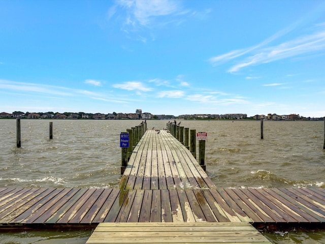 dock area featuring a water view