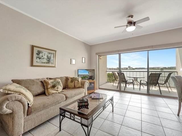 living room with ceiling fan and crown molding