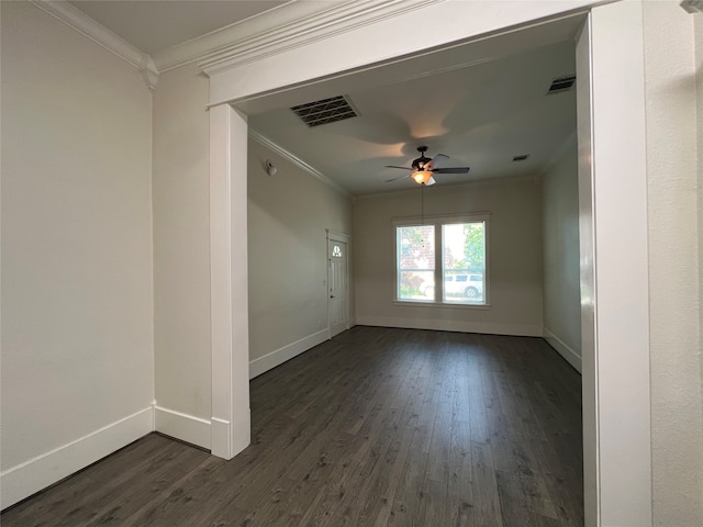 unfurnished room with ornamental molding, ceiling fan, and dark hardwood / wood-style floors