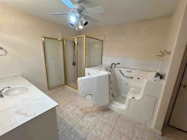 bathroom featuring tile patterned flooring, vanity, ceiling fan, and independent shower and bath