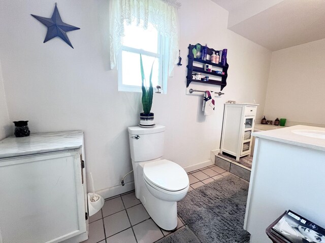13074 Clover Ln, Iola, TX 77861 - bathroom with tile patterned floors, vanity, and toilet