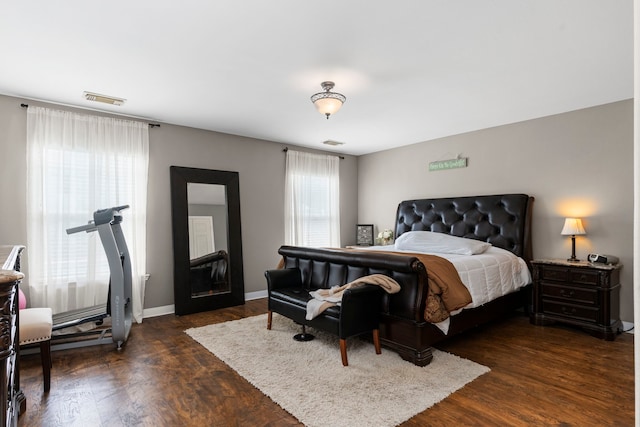 bedroom featuring dark wood-type flooring