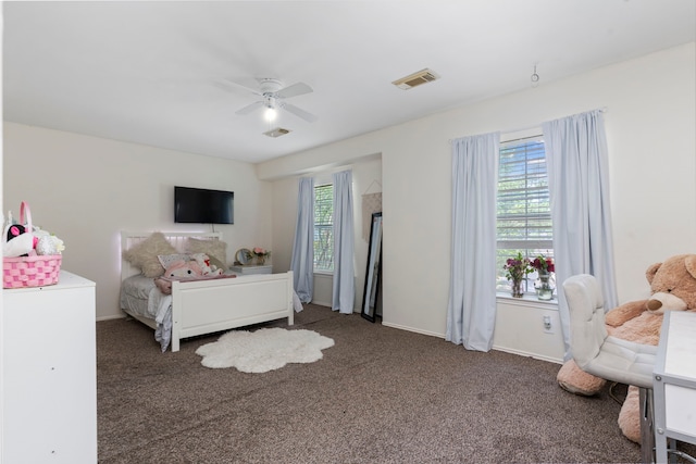 carpeted bedroom featuring ceiling fan