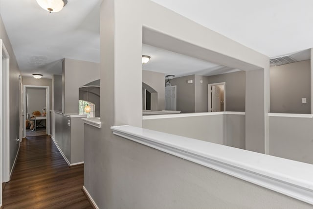 hallway featuring dark hardwood / wood-style floors