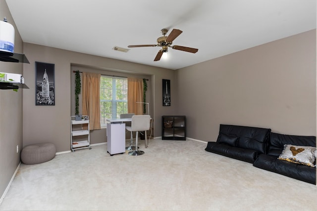 interior space with ceiling fan