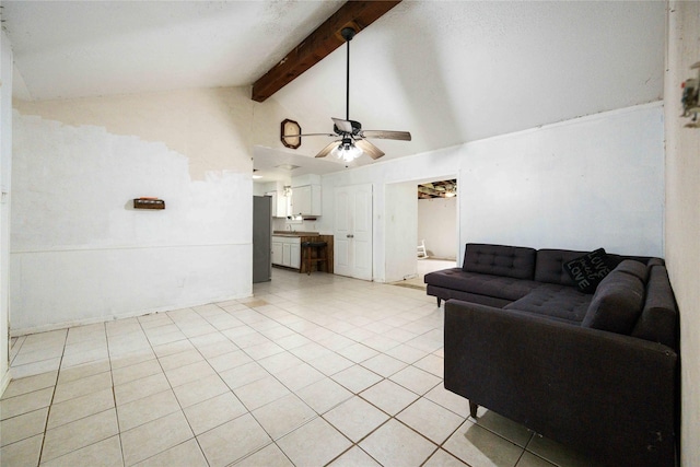 tiled living room featuring ceiling fan, beam ceiling, and high vaulted ceiling