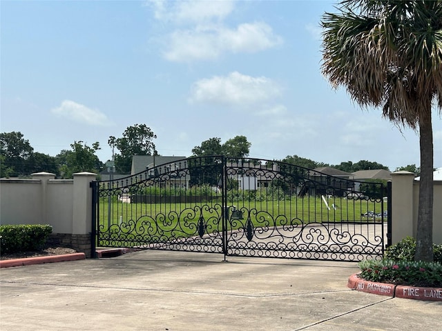 4025 Boardwalk Blvd, Seabrook, TX 77586 - gate featuring a lawn