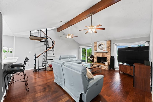 living room featuring dark wood-type flooring, ceiling fan, lofted ceiling with beams, and a brick fireplace