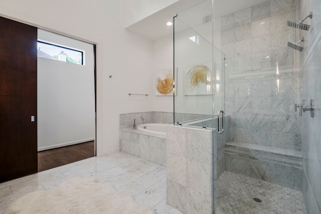 bathroom with independent shower and bath