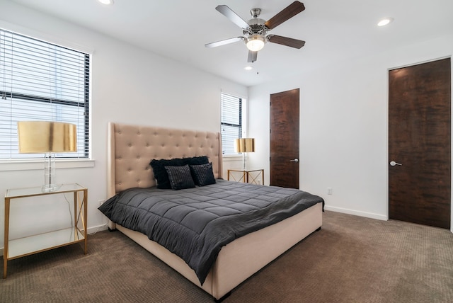 carpeted bedroom featuring ceiling fan