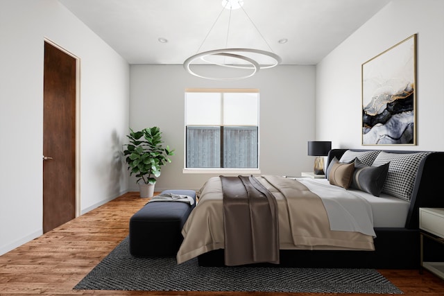 bedroom featuring hardwood / wood-style flooring