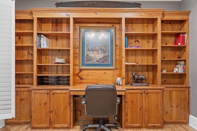 office with light wood-type flooring