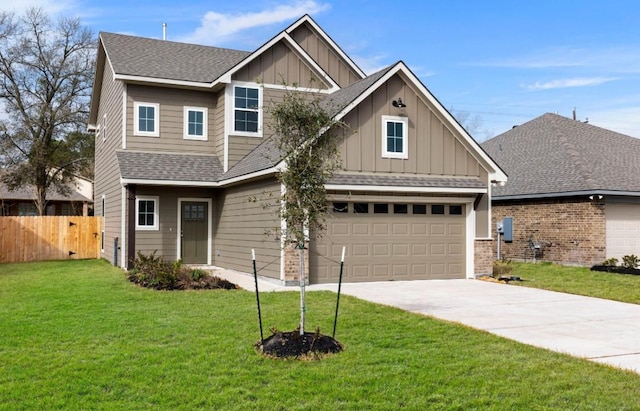 craftsman inspired home with a front lawn and a garage