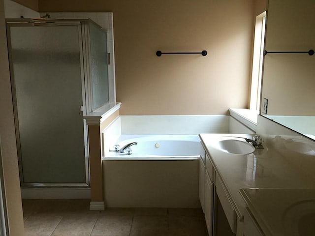 bathroom with vanity, tile patterned floors, and separate shower and tub