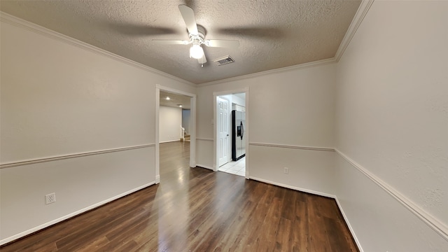 unfurnished room featuring ceiling fan, crown molding, wood-type flooring, and a textured ceiling