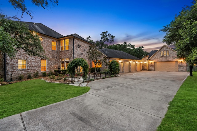 view of front of property with a yard