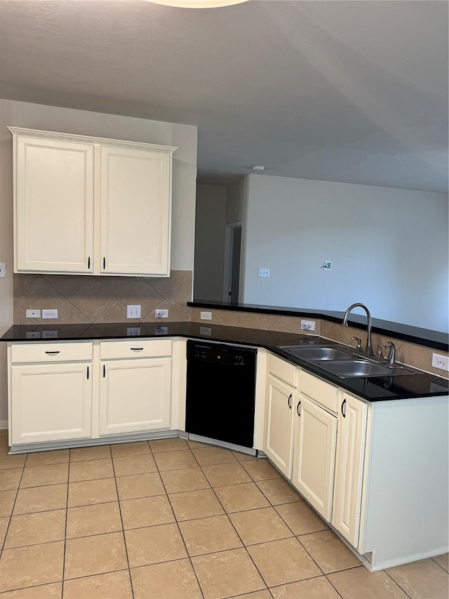 kitchen with light tile patterned floors, dishwasher, sink, and white cabinetry