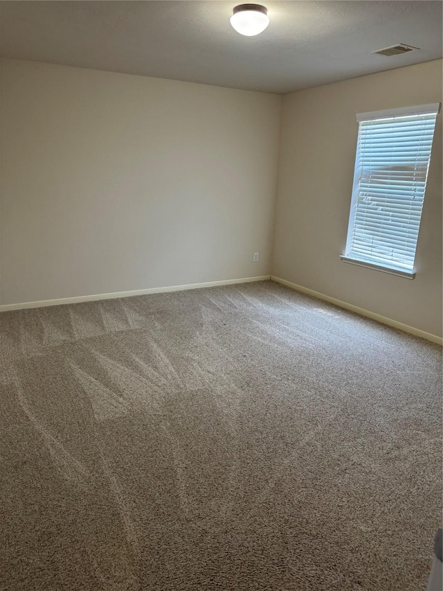 empty room with carpet floors