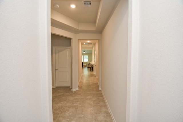 corridor with light tile flooring