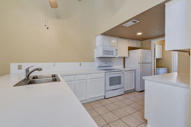 kitchen with white cabinetry, sink, ceiling fan, white appliances, and light tile patterned floors