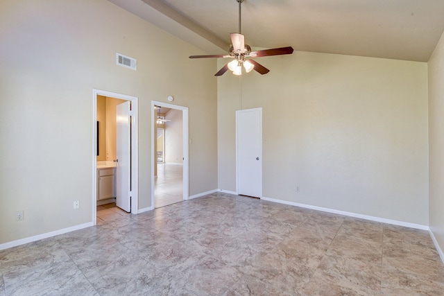 spare room featuring ceiling fan and high vaulted ceiling