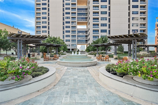 view of home's community with a pergola