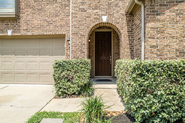 entrance to property featuring a garage