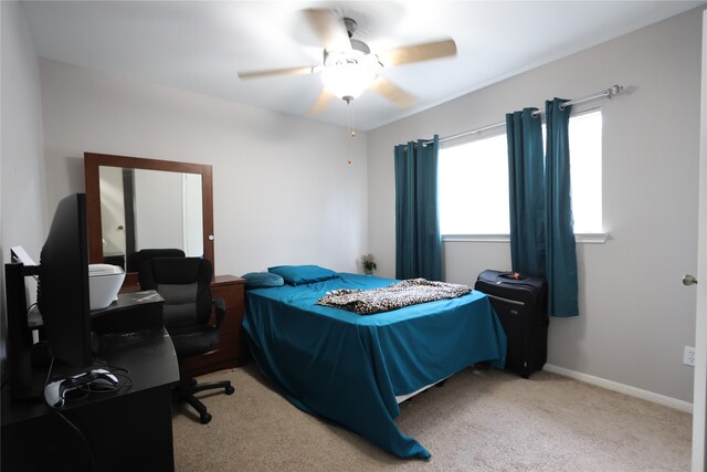 bedroom with carpet flooring and ceiling fan