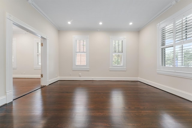 unfurnished room featuring crown molding and dark hardwood / wood-style floors