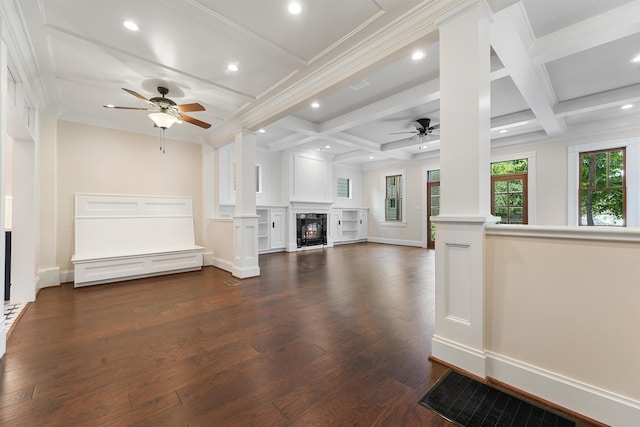 unfurnished living room with decorative columns, coffered ceiling, and beam ceiling