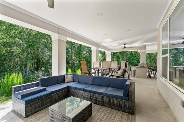 view of patio / terrace with outdoor lounge area and an outdoor bar