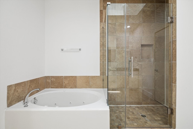 bathroom with independent shower and bath