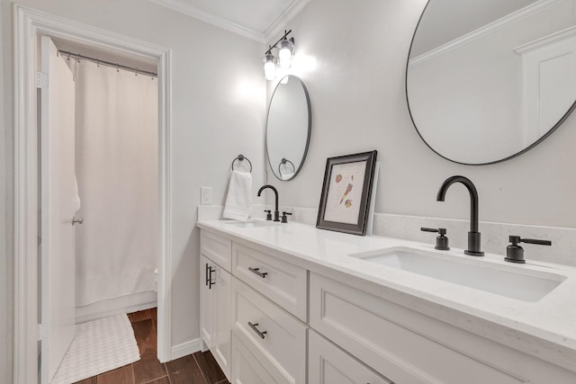 bathroom featuring shower / bathtub combination with curtain, crown molding, and vanity