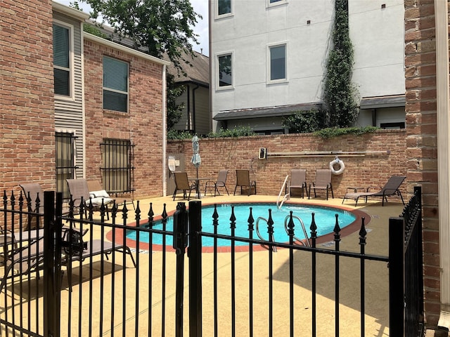 view of pool with a patio area