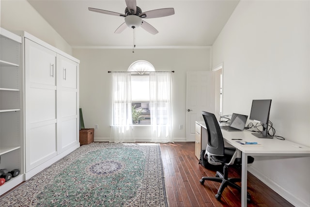 home office featuring lofted ceiling, ceiling fan, and dark hardwood / wood-style floors