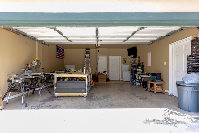 garage with white fridge