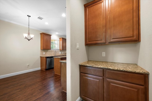 kitchen featuring crown molding, light stone countertops, stainless steel dishwasher, a chandelier, and dark hardwood / wood-style flooring