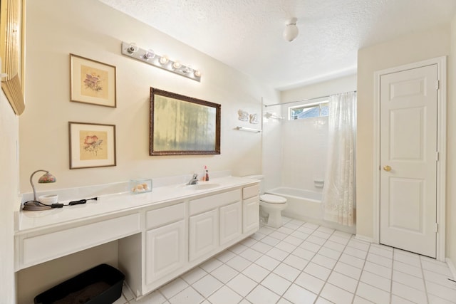 full bathroom featuring a textured ceiling, vanity, shower / tub combo with curtain, and tile patterned flooring