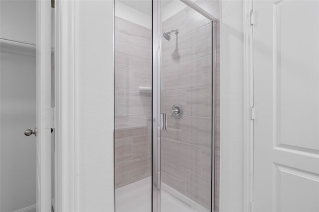 bathroom with an enclosed shower