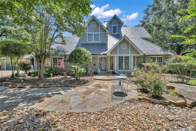 view of front of home with a patio area