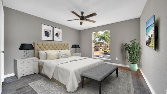 3300 Pebblebrook Dr Unit 42, Seabrook, TX 77586 - bedroom featuring wood finished floors, baseboards, and ceiling fan