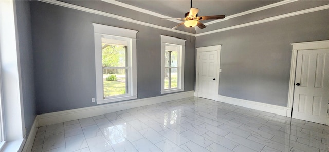 spare room featuring crown molding and ceiling fan