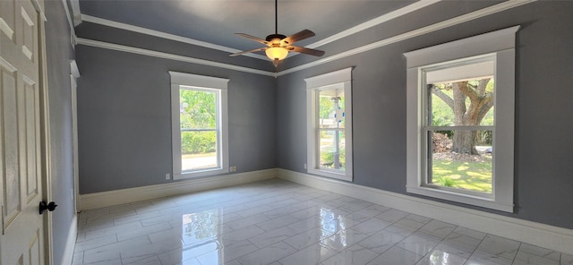 unfurnished room with ceiling fan and crown molding