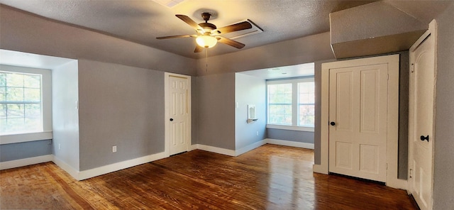 unfurnished bedroom featuring ceiling fan and hardwood / wood-style floors