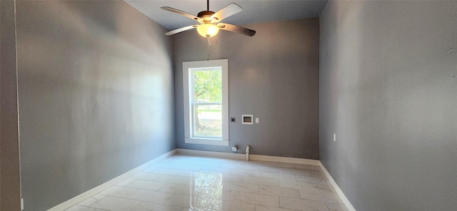 spare room with ceiling fan