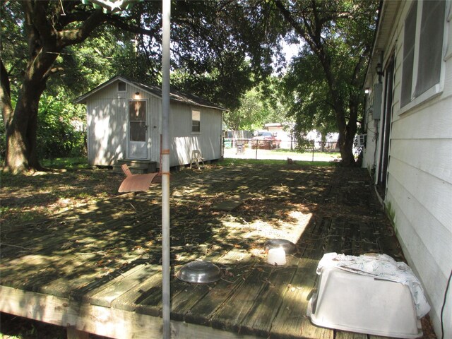 606 E Humble St, Baytown, TX 77520 - view of yard with an outdoor structure and fence