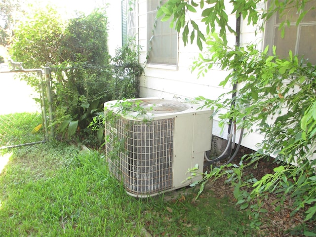 606 E Humble St, Baytown, TX 77520 - details featuring cooling unit and fence